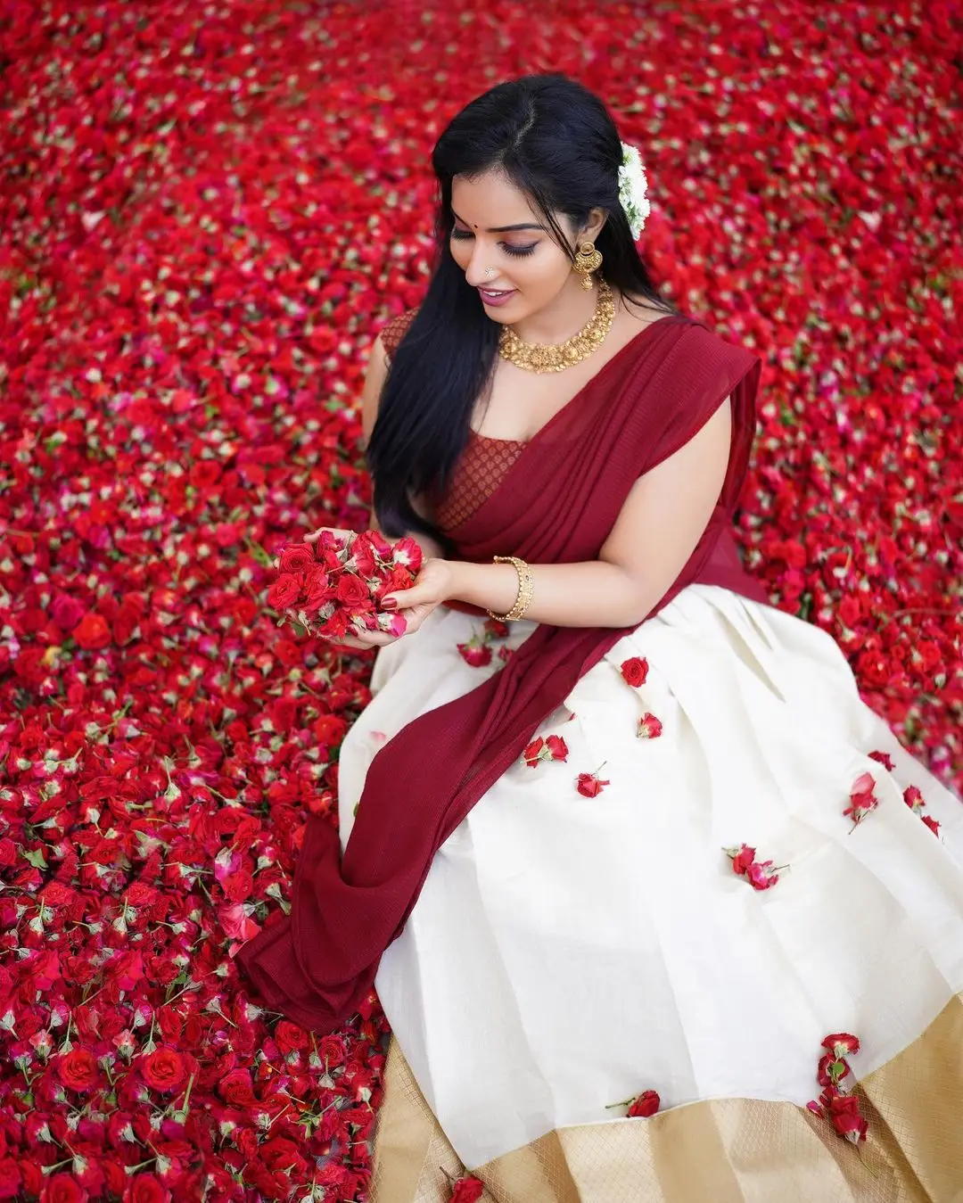 Malavika Menon In South Indian Traditional Red Half Saree Voni Blouse